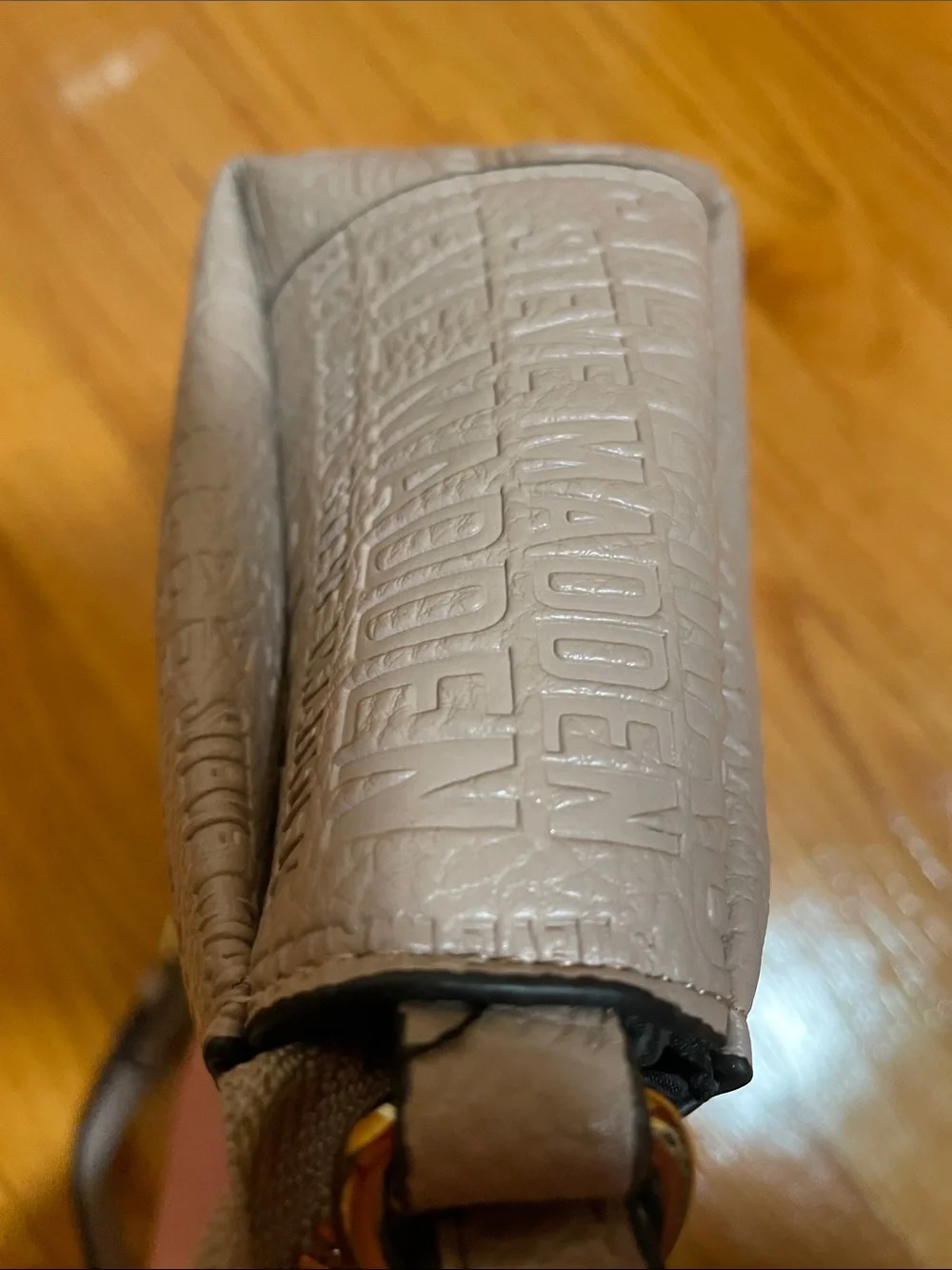 Steve Madden embossed logo crossbody bag beige long adjustable strap